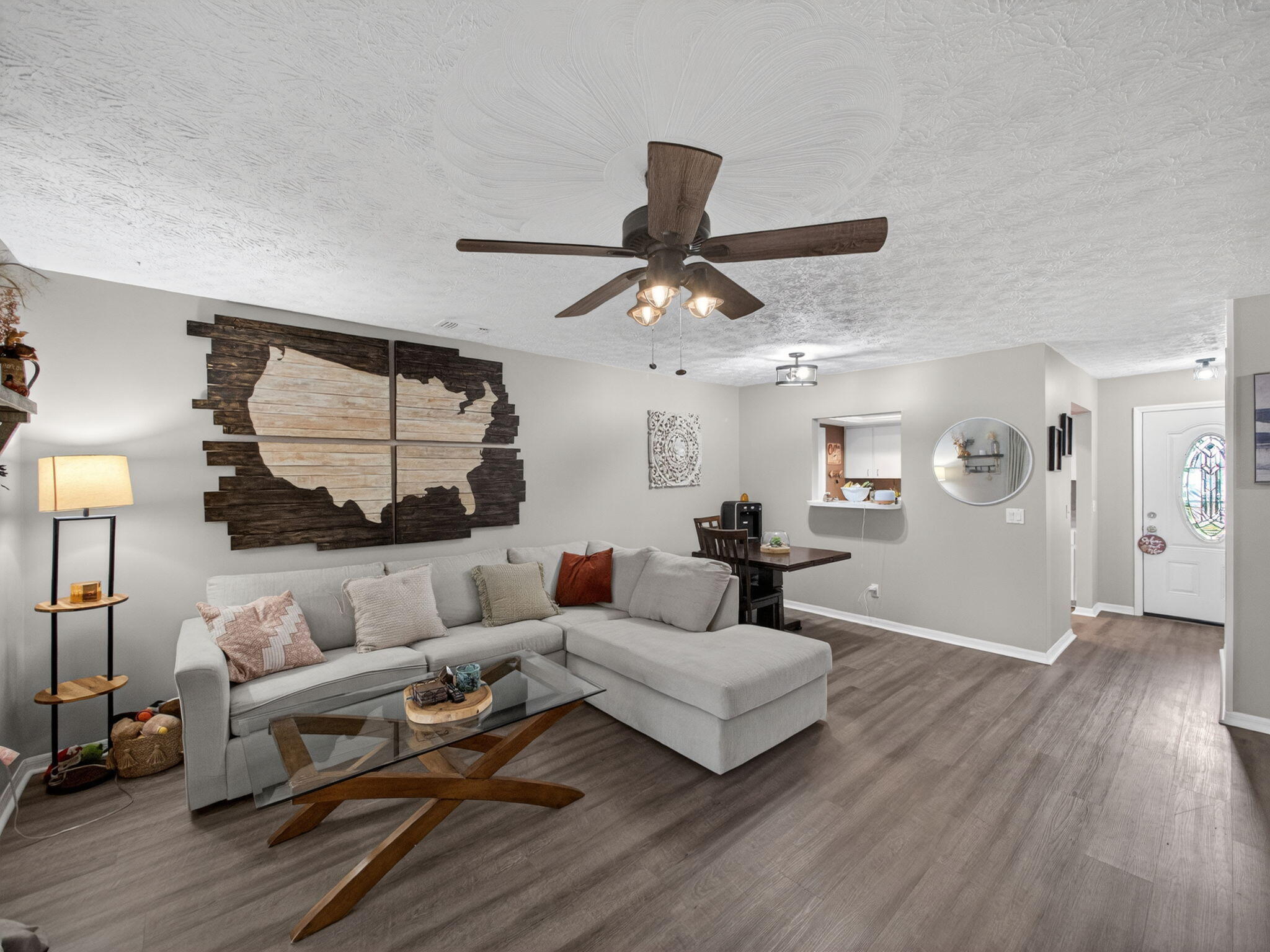 991 Northwest 15th Terrace Stuart, FL 34994 - Photo 8 of 24 a living room with furniture and a large window