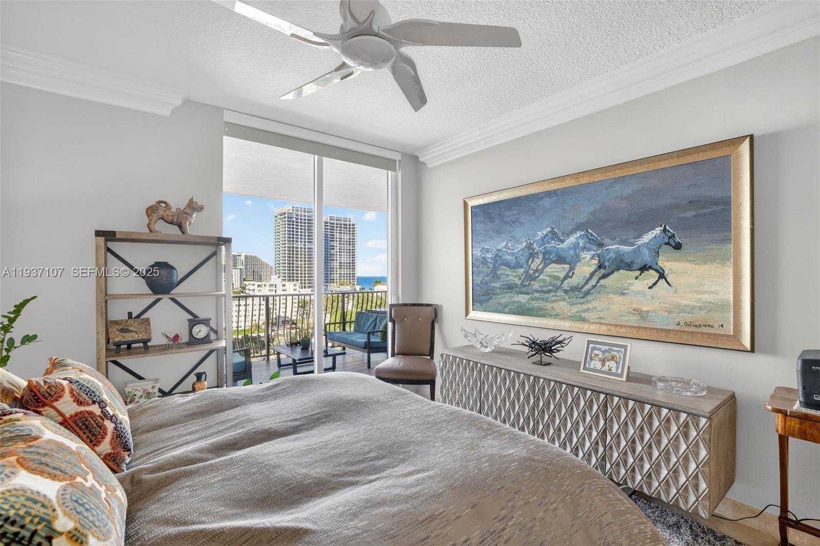 100 South Birch Road, Unit 1103F Fort Lauderdale, FL 33316 - Photo 47 of 80 Guest bedroom (2nd primary bedroom) w/ sliders off to the balcony and ocean views & motorized window roller shade.