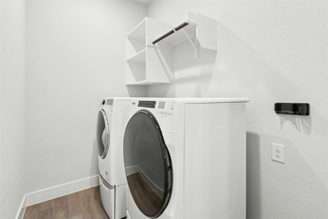 1121 Spring Gulch Lane Georgetown, TX 78628 - Photo 20 of 33 a utility room with dryer and washer