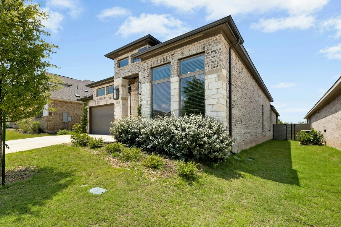 1121 Spring Gulch Lane Georgetown, TX 78628 - Photo 3 of 33 a front view of house with yard