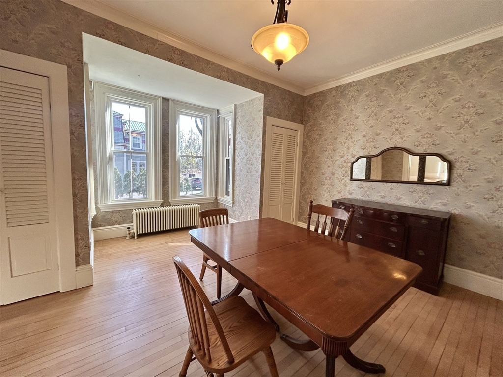 48 Congress Street Greenfield, MA 01301 - Photo 9 of 36 a view of a dining room with furniture and window
