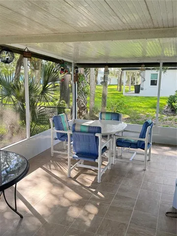 a outdoor space with lots of furniture and garden view