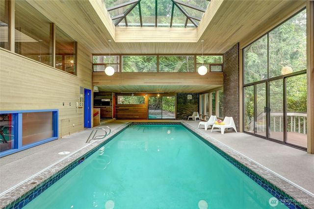 a view of an house with backyard porch and wooden floor