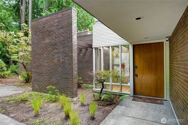 a backyard of a house with seating space