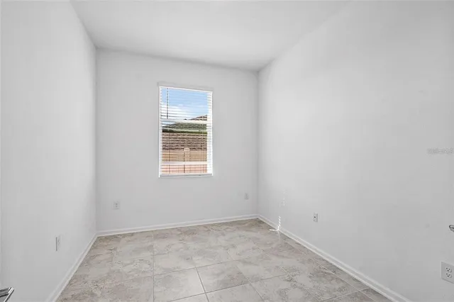 an empty room with a window