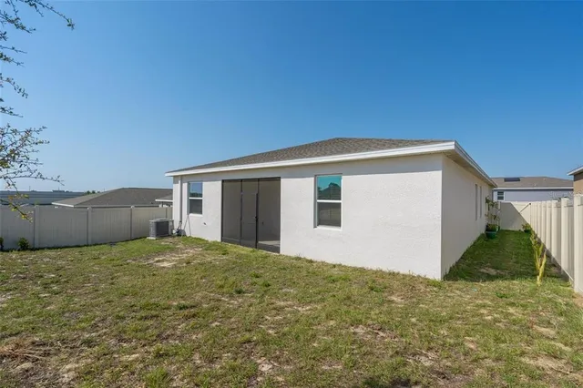 a house with yard in front of it