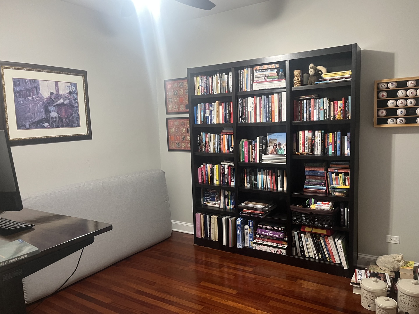 27 North Morgan Street, Unit 3 Chicago, IL 60607 - Photo 14 of 18 a view of a workspace with bookshelf