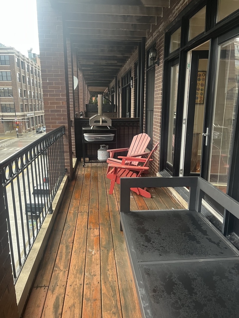 27 North Morgan Street, Unit 3 Chicago, IL 60607 - Photo 9 of 18 a view of balcony with furniture