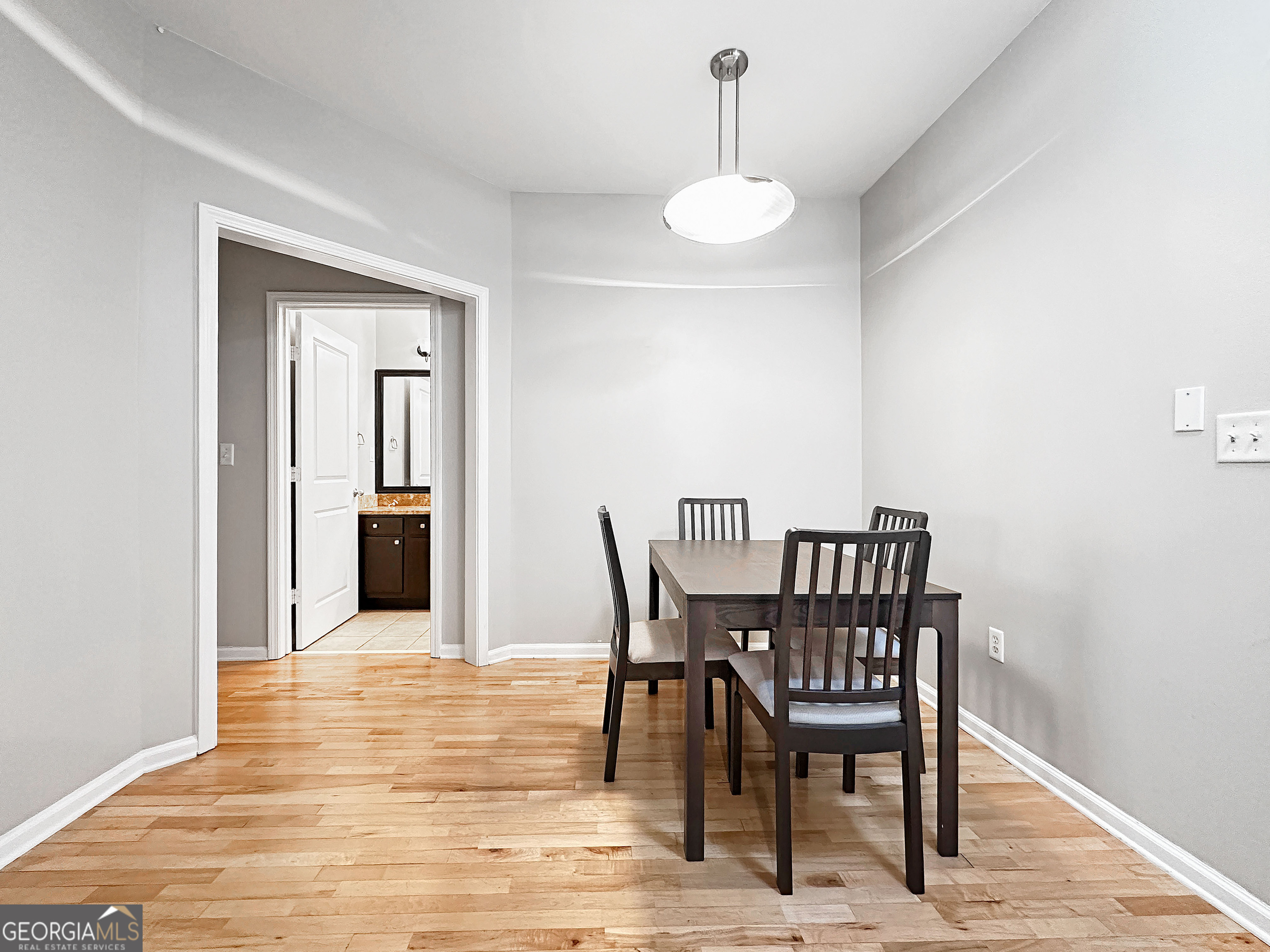 821 Ralph McGill Boulevard Northeast, Unit 3219 Atlanta, GA 30306 - Photo 7 of 12 a view of a dining room with furniture