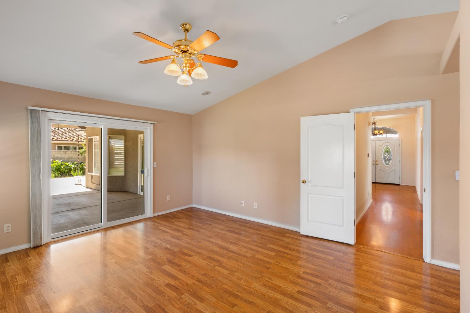 43 East Loop Madera, CA 93637 - Photo 31 of 49 a view of an empty room with window and wooden floor