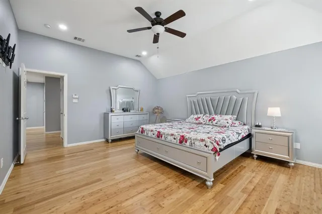 a bathroom with a bathtub sink and mirror