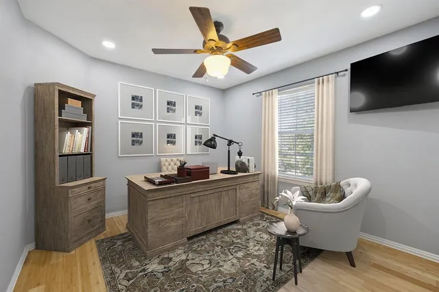 a bathroom with a sink a toilet and shower curtain