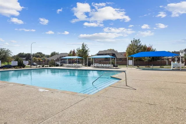 a picture of a bathroom with a bathtub