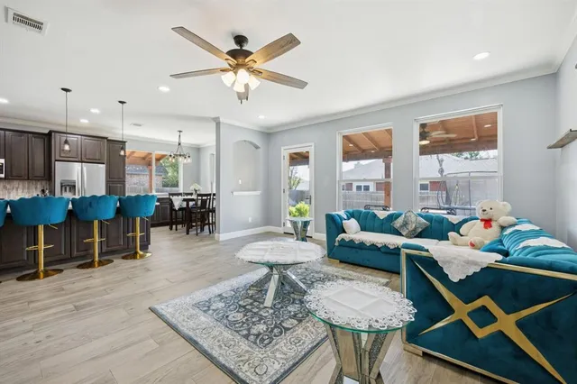 a living room with furniture and a table