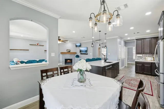 a living room with furniture and a gate