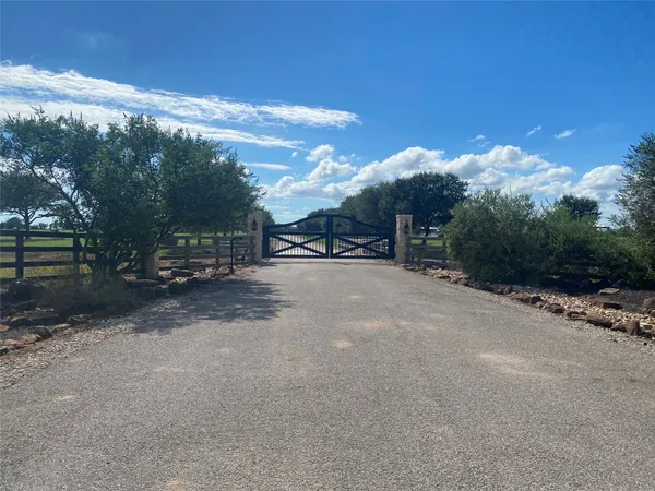 a view of street with parked cars