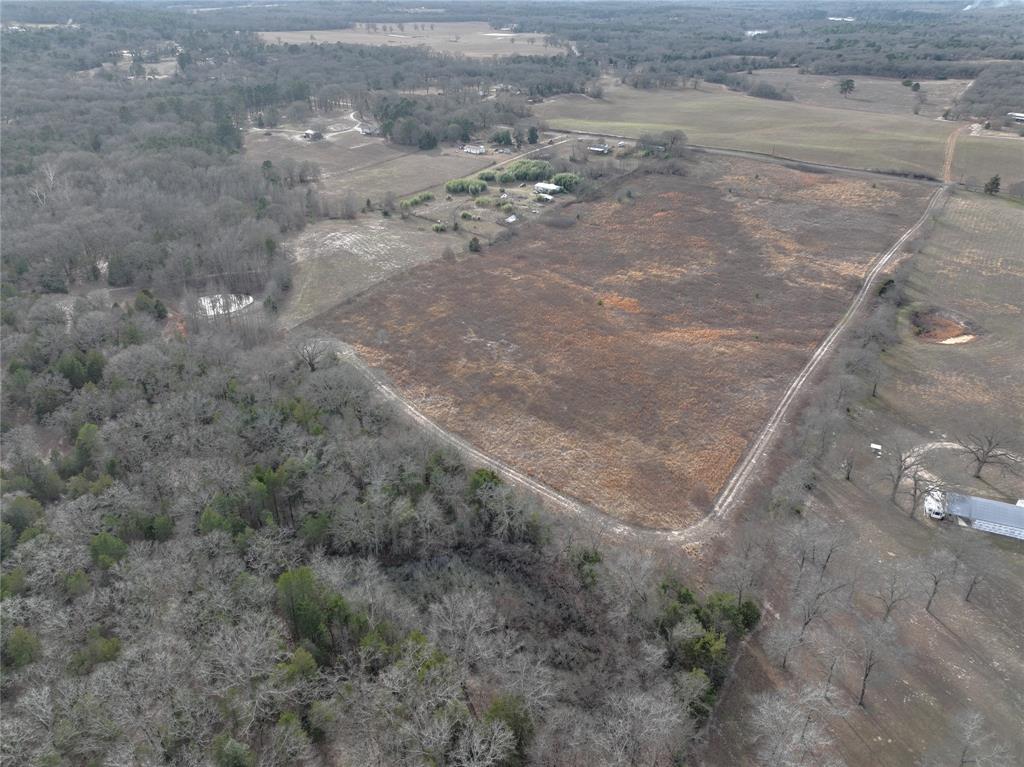 3250 County Road 3250 Quitman, TX 75783 - Photo 30 of 30 a view of a dry yard with wooden fence