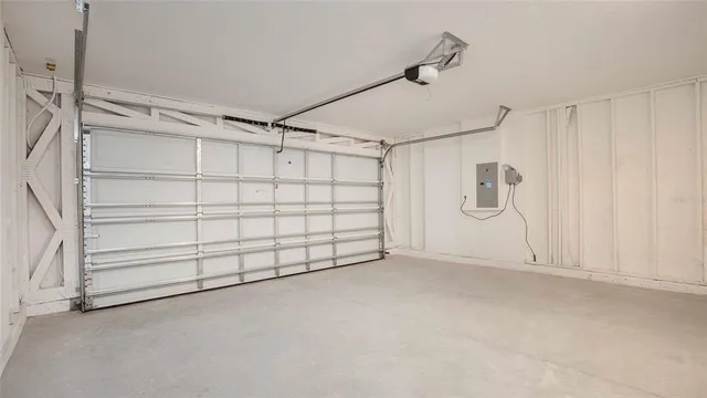 a view of front of a house with a garden