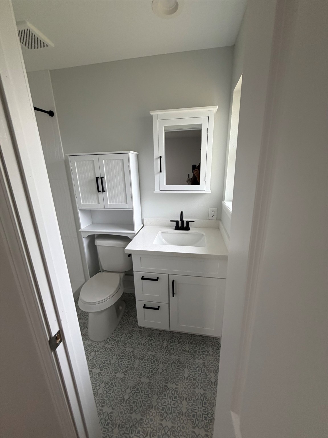 1920 Ripple Creek Drive Rosenberg, TX 77471 - Photo 21 of 26 a bathroom with a toilet sink and mirror