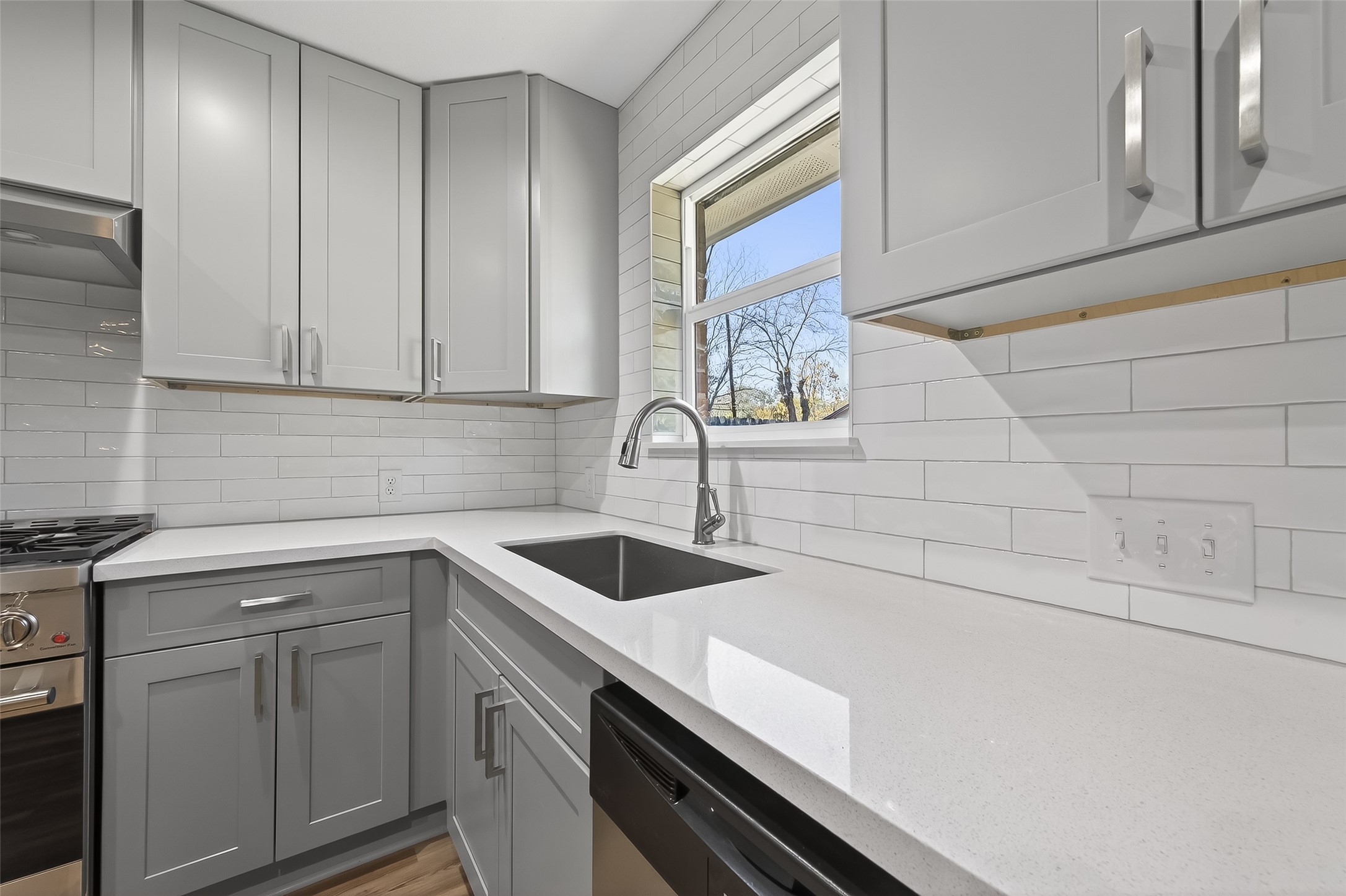 1920 Ripple Creek Drive Rosenberg, TX 77471 - Photo 8 of 26 a kitchen with a sink and cabinets