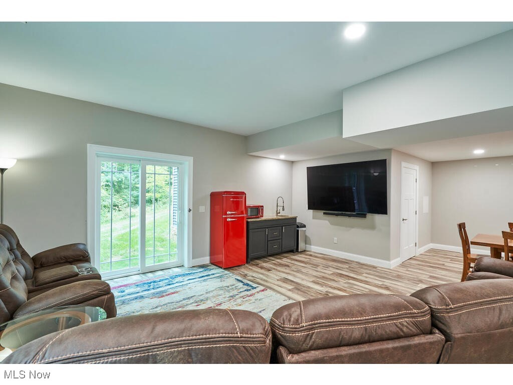 1570 Shade Road Akron, OH 44333 - Photo 29 of 45 Family room in the lower level with slider to yard