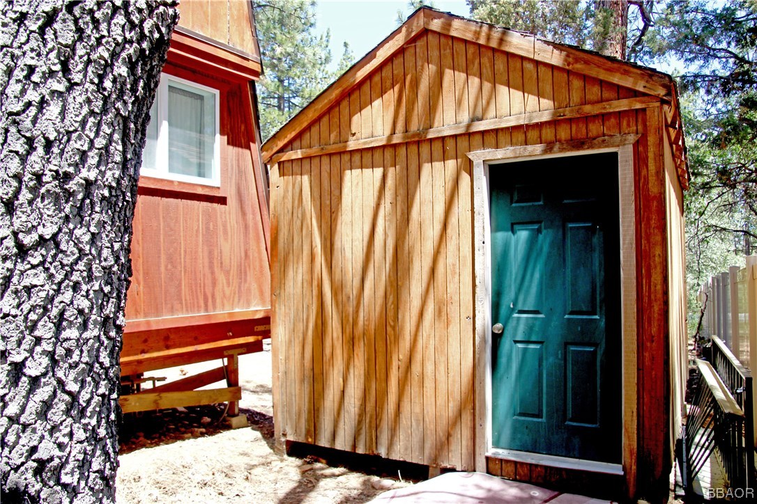 229 Pine Lane Sugarloaf, CA 92386 - Photo 21 of 24 a front view of a house with a yard