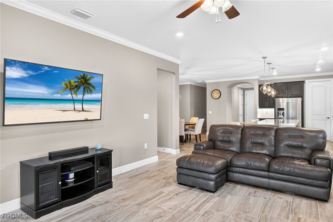 11800 Benchley Court Fort Myers, FL 33913 - Photo 12 of 50 a living room with furniture and a flat screen tv