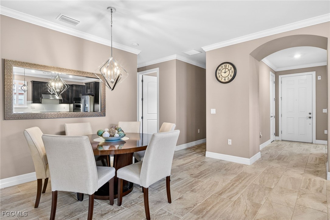 11800 Benchley Court Fort Myers, FL 33913 - Photo 13 of 50 a view of a dining room with furniture