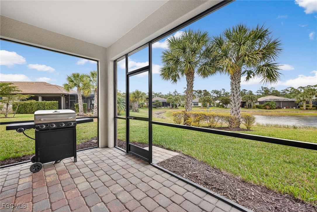 11800 Benchley Court Fort Myers, FL 33913 - Photo 27 of 50 a view of a porch with furniture and garden