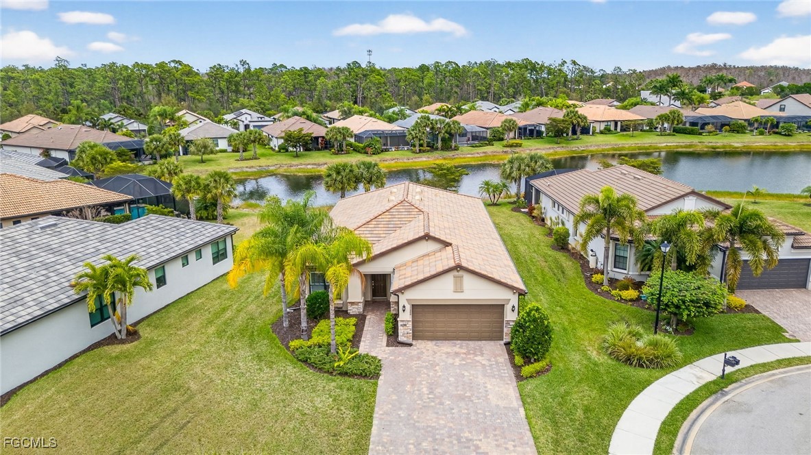 11800 Benchley Court Fort Myers, FL 33913 - Photo 31 of 50 an aerial view of a house with a lake view