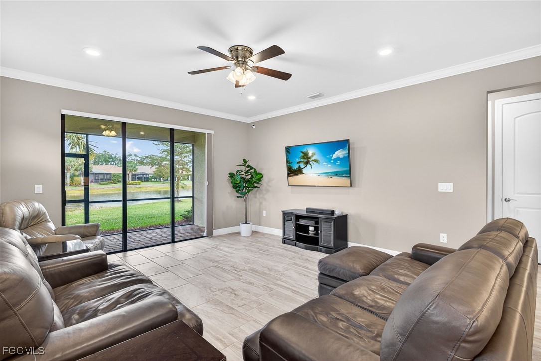 11800 Benchley Court Fort Myers, FL 33913 - Photo 8 of 50 a living room with furniture and a flat screen tv