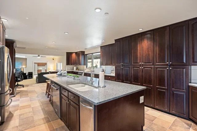 a kitchen with counter top space and appliances