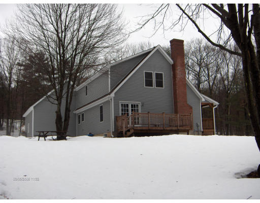 158 Briggs Road West Athol, MA 01331 - Photo 1 of 28 a view of house with a yard covered in snow