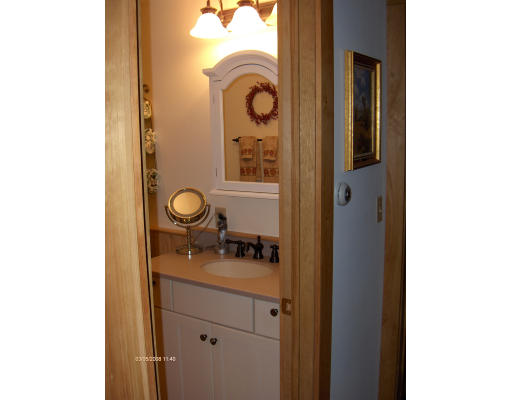 158 Briggs Road West Athol, MA 01331 - Photo 11 of 28 a bathroom with a sink and a mirror
