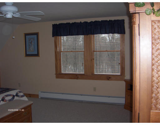 158 Briggs Road West Athol, MA 01331 - Photo 14 of 28 a bathroom with a bathtub and a window