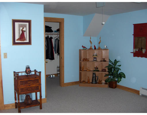 158 Briggs Road West Athol, MA 01331 - Photo 15 of 28 a bed room with furniture and a potted plant