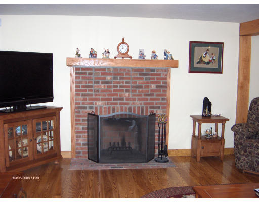 158 Briggs Road West Athol, MA 01331 - Photo 5 of 28 a living room with furniture a flat screen tv and a fireplace