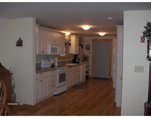 158 Briggs Road West Athol, MA 01331 - Photo 6 of 28 a kitchen with stainless steel appliances a refrigerator sink and white cabinets