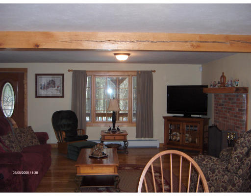 158 Briggs Road West Athol, MA 01331 - Photo 8 of 28 a living room with furniture and a flat screen tv