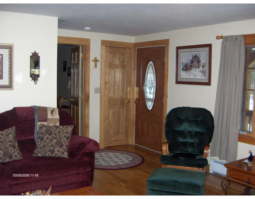 158 Briggs Road West Athol, MA 01331 - Photo 9 of 28 a living room with furniture and a fireplace