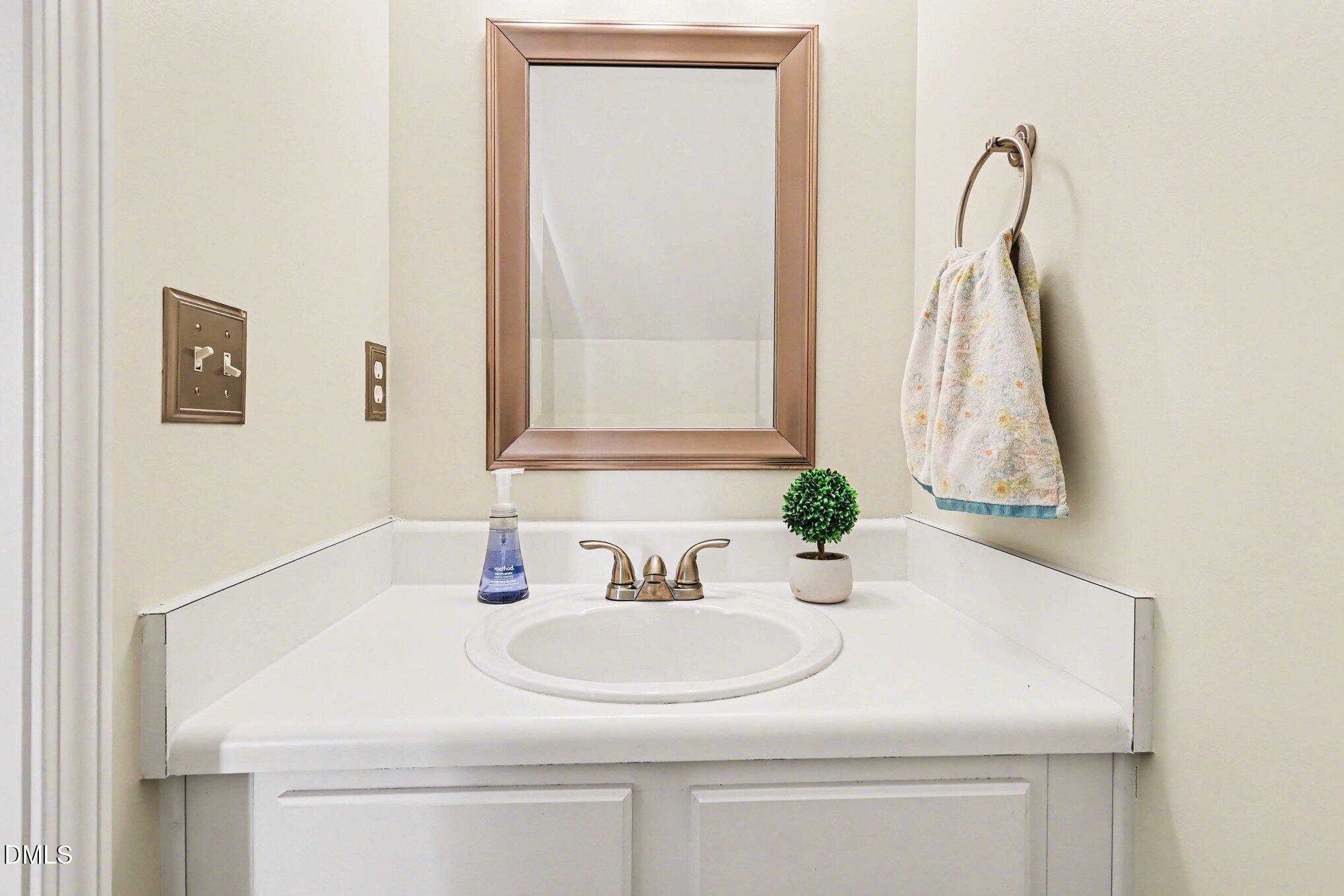 8211 Rhiannon Road Raleigh, NC 27613 - Photo 11 of 25 Half Bathroom