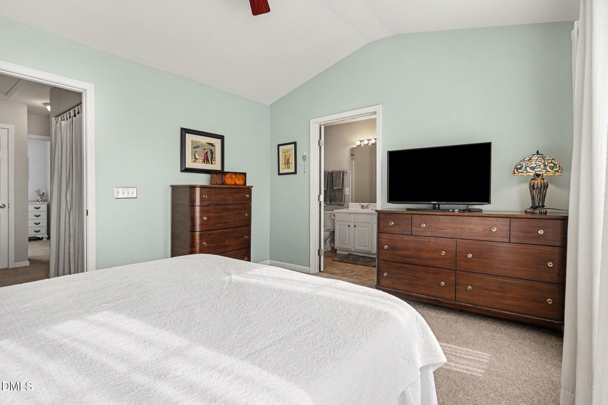 8211 Rhiannon Road Raleigh, NC 27613 - Photo 13 of 25 Primary Bedroom