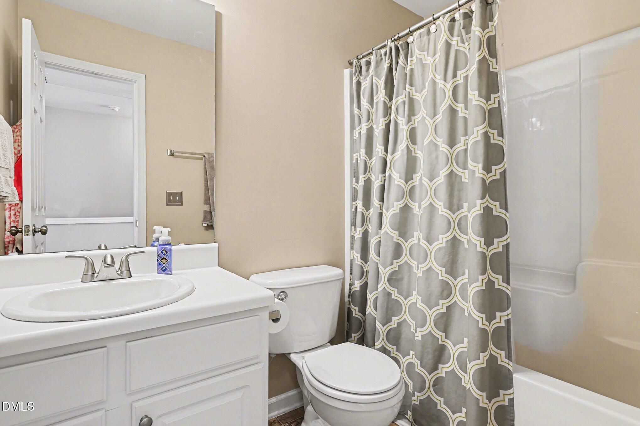 8211 Rhiannon Road Raleigh, NC 27613 - Photo 18 of 25 Full Hall Bath