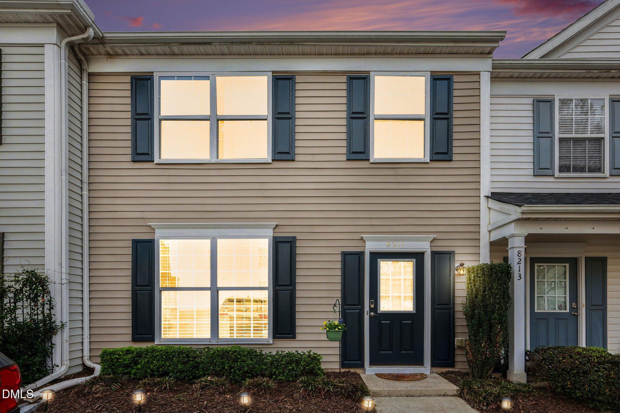 8211 Rhiannon Road Raleigh, NC 27613 - Photo 22 of 25 Dusk at 8211 Rhiannon