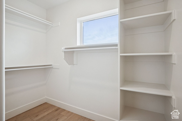1615 North Angel Street, Unit H Layton, UT 84041 - Photo 32 of 55 Walk in closet with light wood finished floors