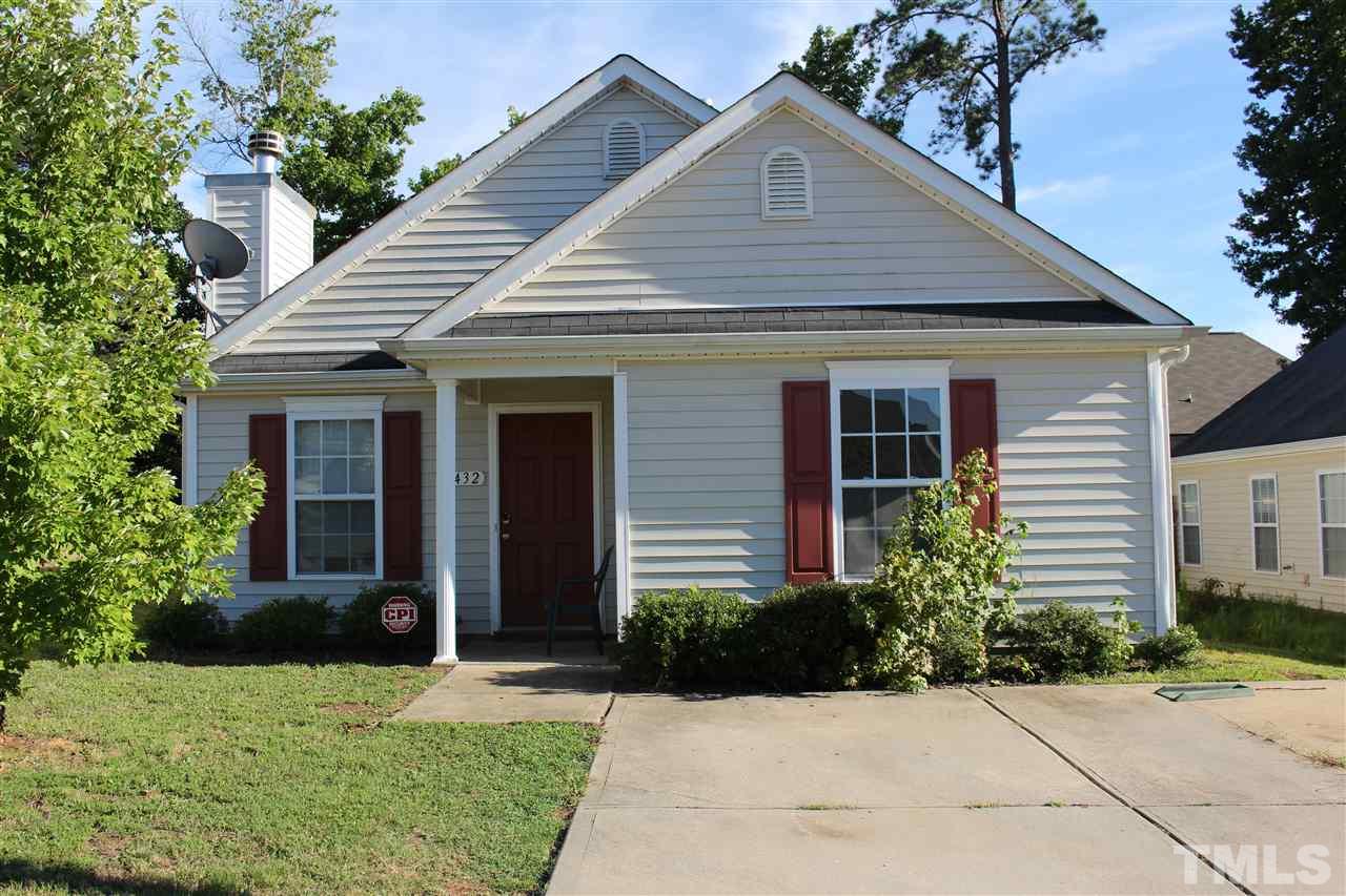 1432 Ricochet Drive Raleigh, NC 27610 - Photo 1 of 23 a front view of a house with a yard