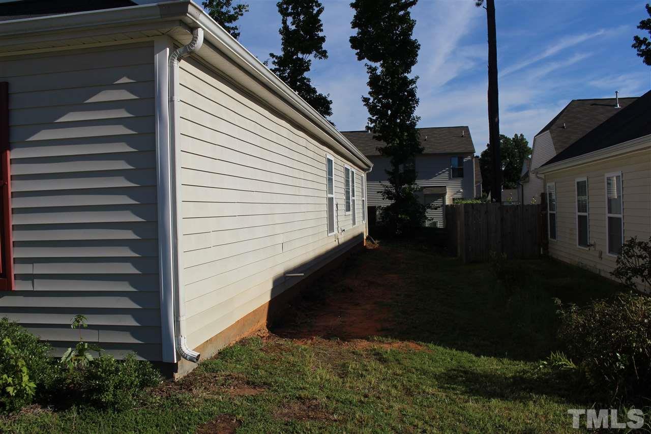 1432 Ricochet Drive Raleigh, NC 27610 - Photo 2 of 23 a view of backyard with potted plants
