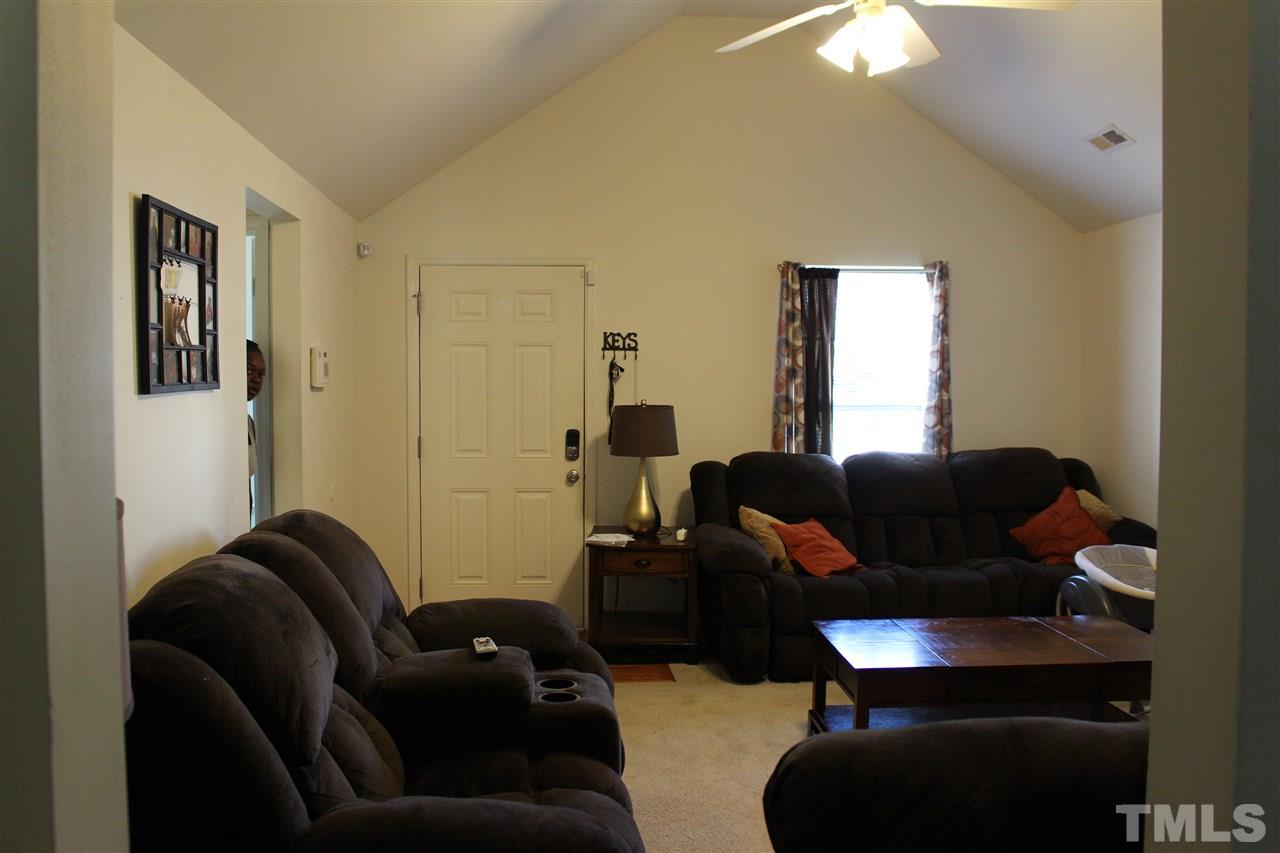 1432 Ricochet Drive Raleigh, NC 27610 - Photo 8 of 23 a living room with furniture