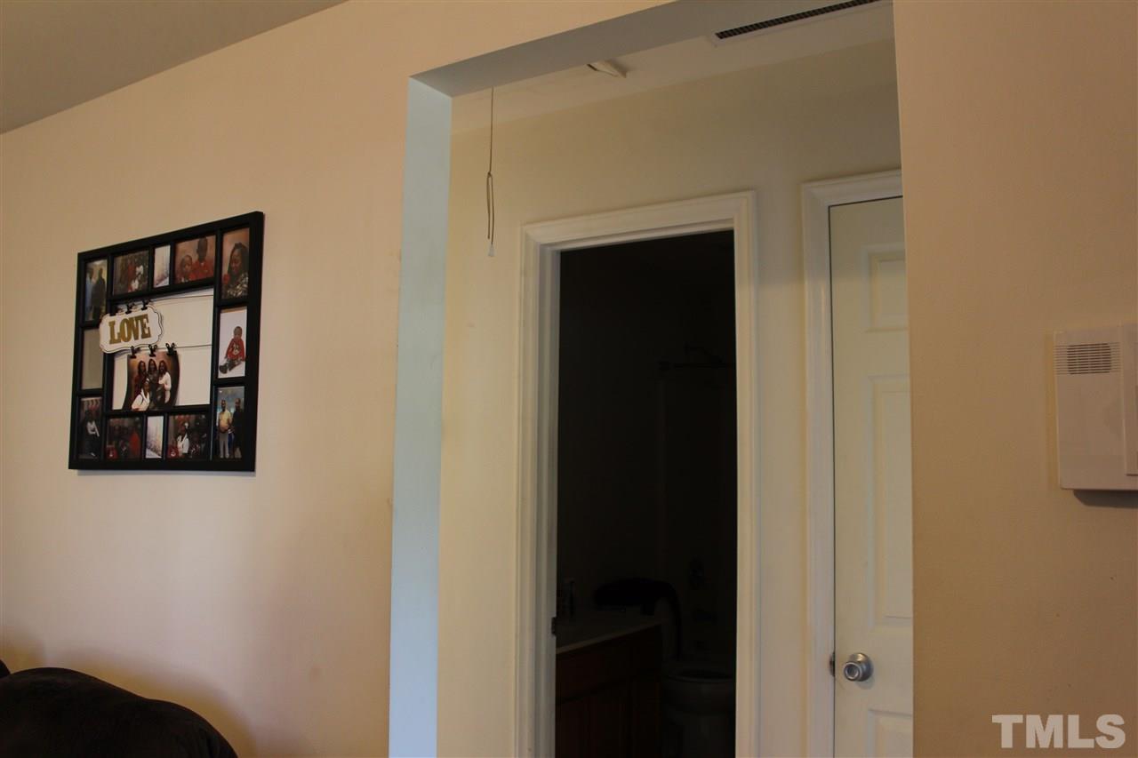 1432 Ricochet Drive Raleigh, NC 27610 - Photo 9 of 23 a view of a hallway