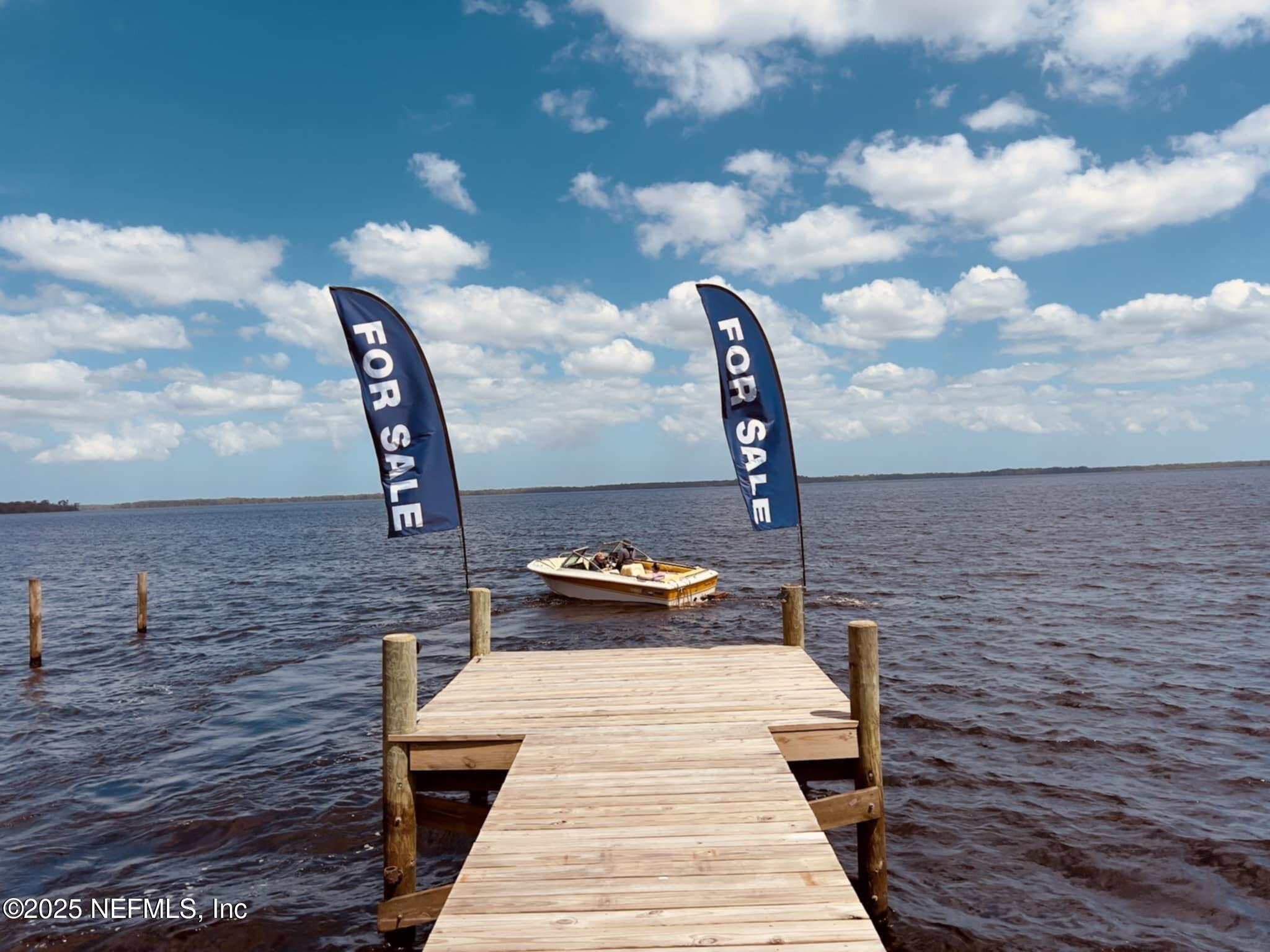 301 South Prospect Street Crescent City, FL 32112 - Photo 89 of 91 Dock with boat view jpg